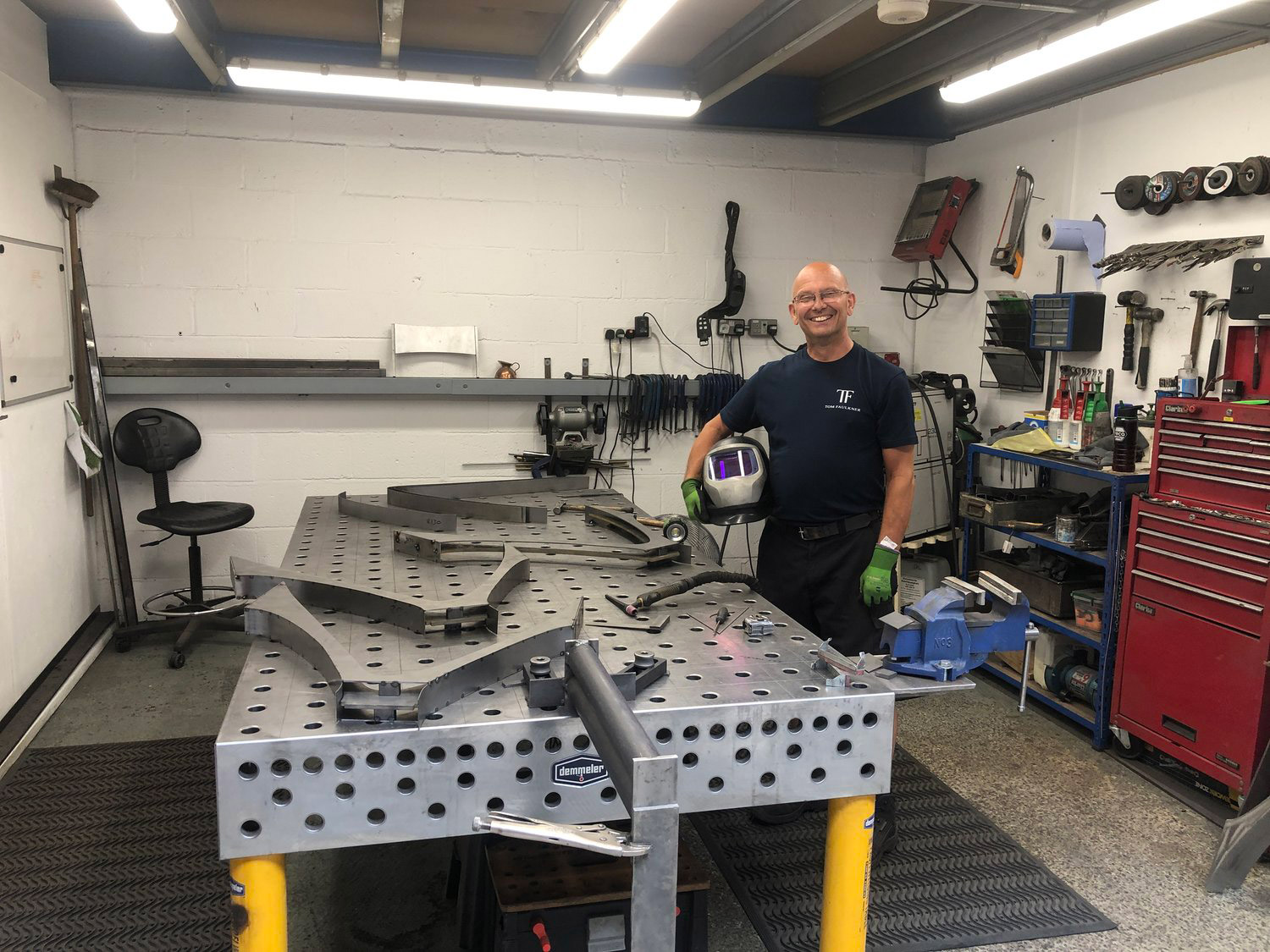 Nigel Bellamy proudly showing us his handy work on the metal work frame for our bespoke dining table.