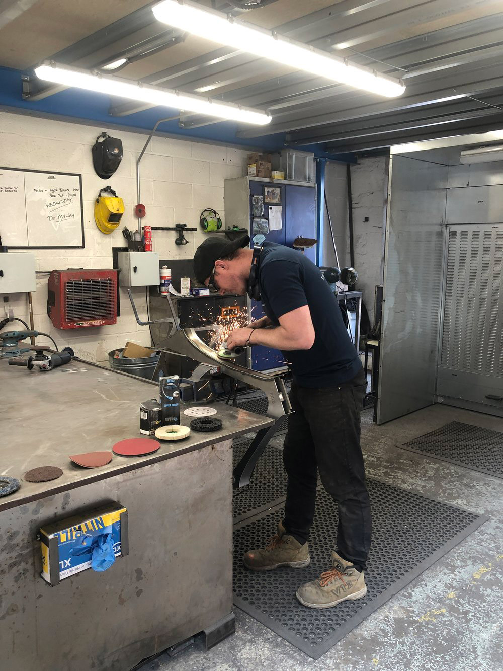 Table+legs+being+sanded